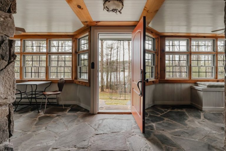 Hardscaping - a room with a stone floor and stone walls