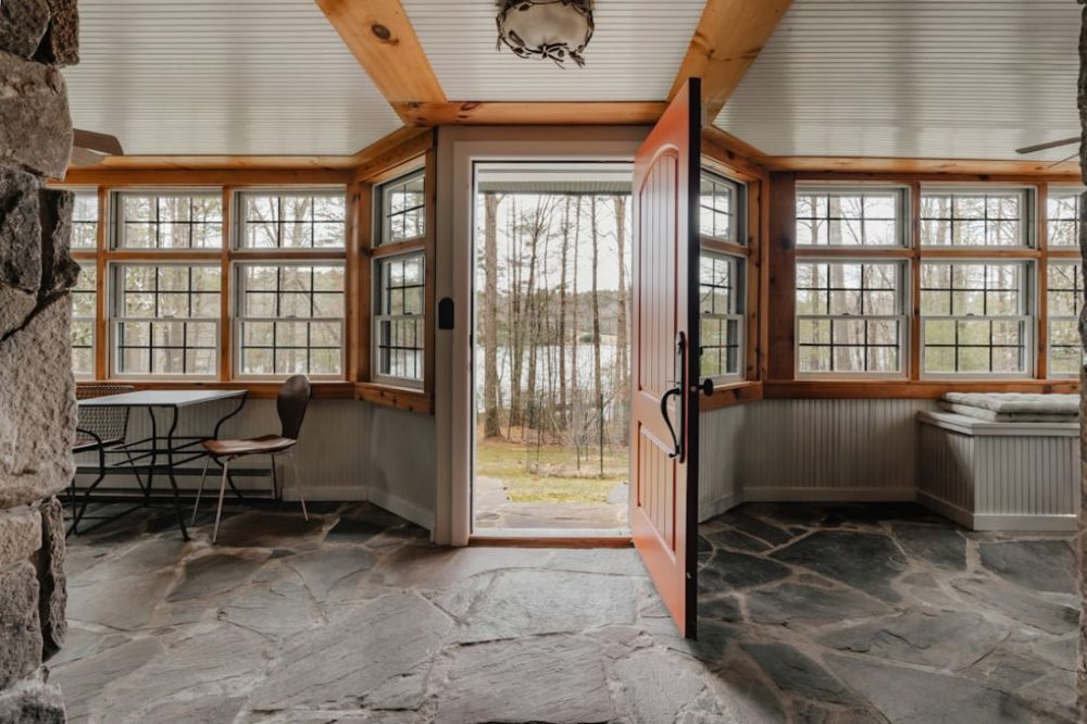 Hardscaping - a room with a stone floor and stone walls